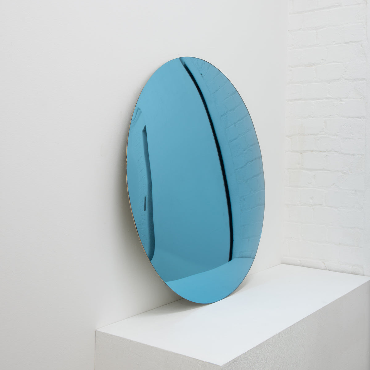 Orbis™ Round Blue Tinted Modern Convex Frameless Mirror