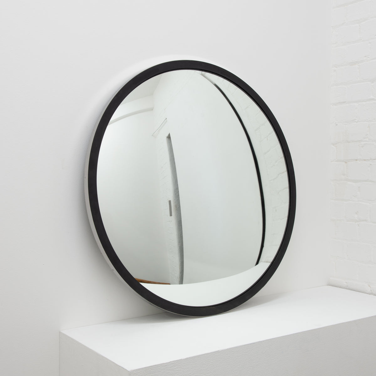 Orbis™ Round Convex Mirror with a Black Timber and a Polished Stainless Steel Frame