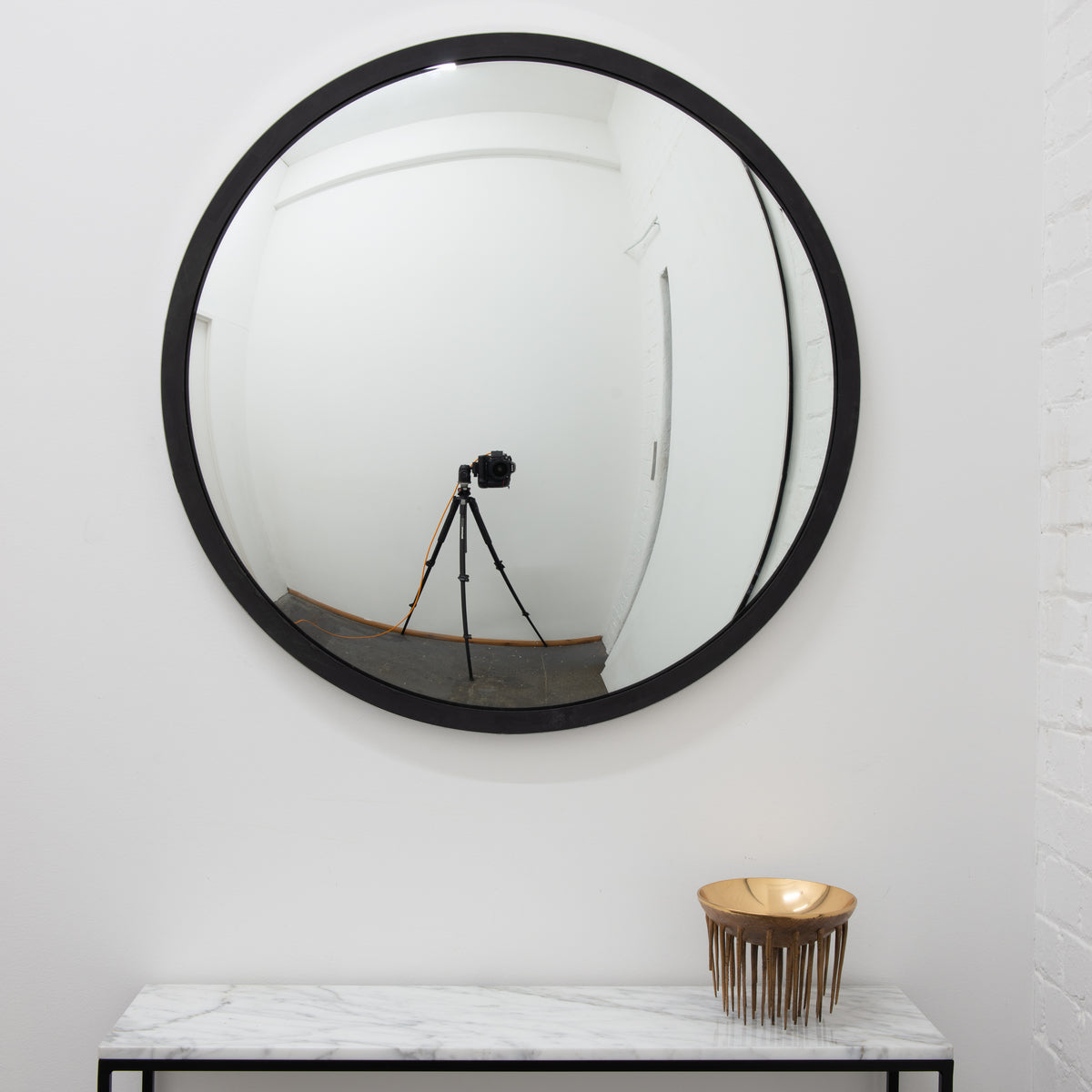 Orbis™ Round Convex Mirror with a Black Timber and a Polished Stainless Steel Frame