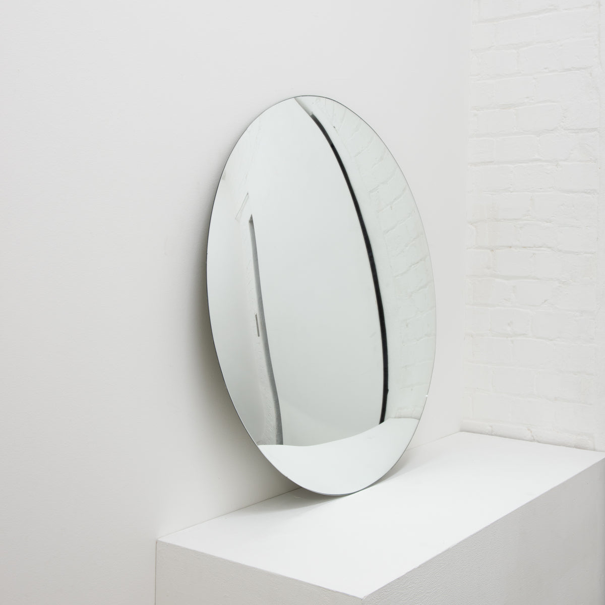 Orbis™ Round Convex Minimalist Frameless Mirror