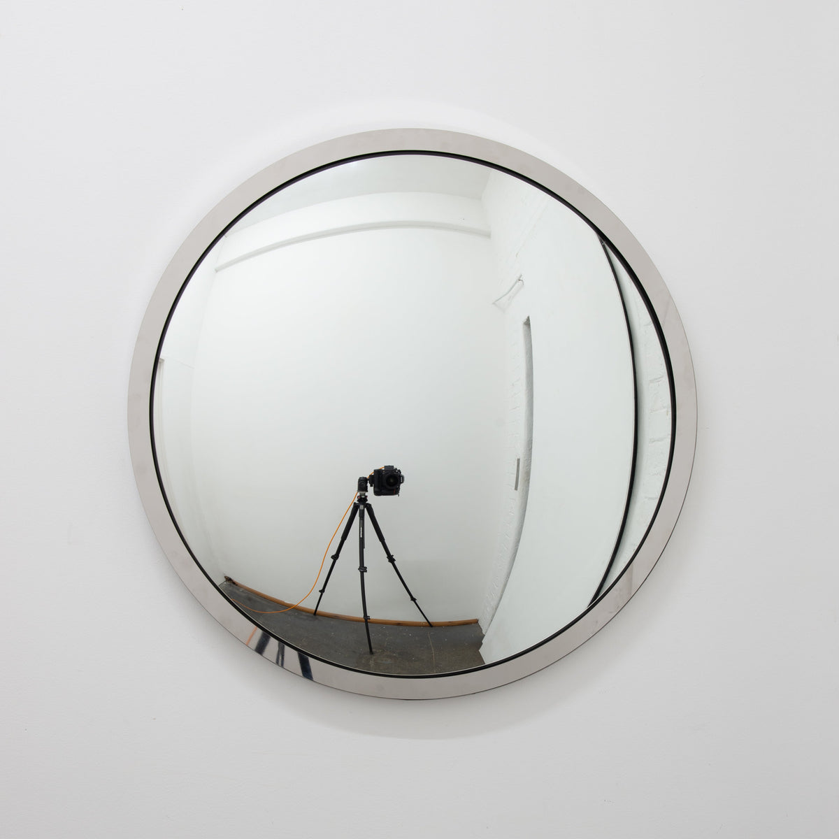 In Stock Orbis Round Convex Mirror with a Polished Stainless Steel Frame