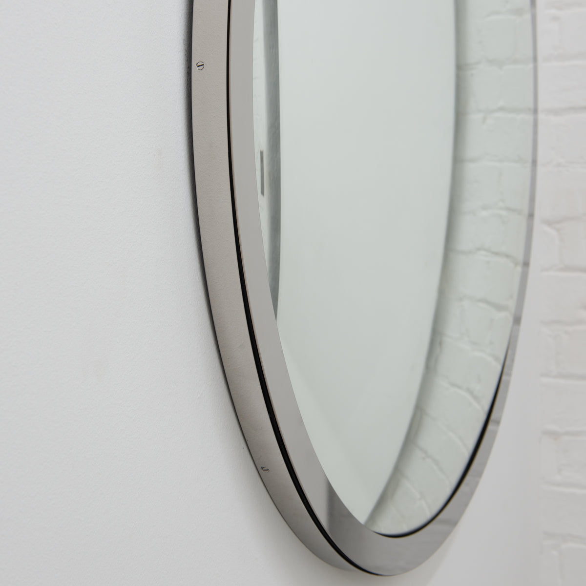 Orbis™ Round Convex Mirror with a Polished Stainless Steel Frame