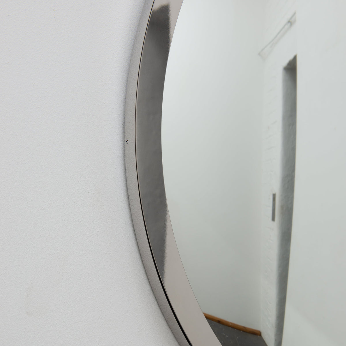 In Stock Orbis Round Convex Mirror with a Polished Stainless Steel Frame