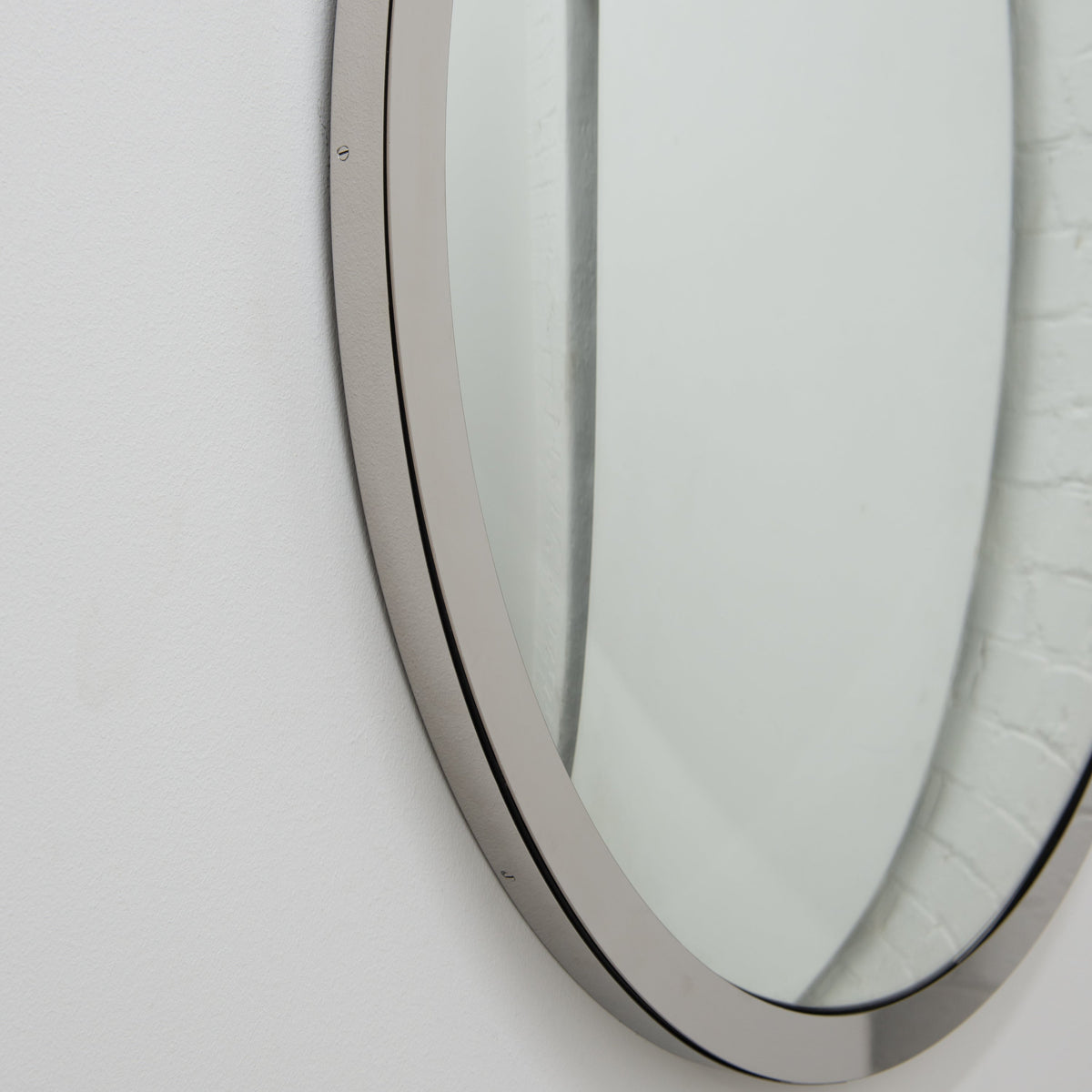 In Stock Orbis Round Convex Mirror with a Polished Stainless Steel Frame