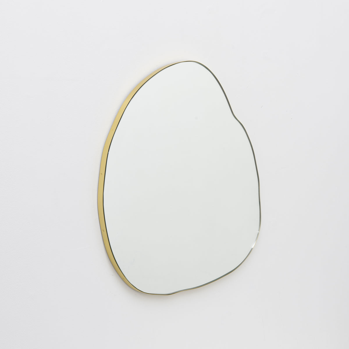 Organic Shaped Modern Mirror with a Brushed Brass Frame