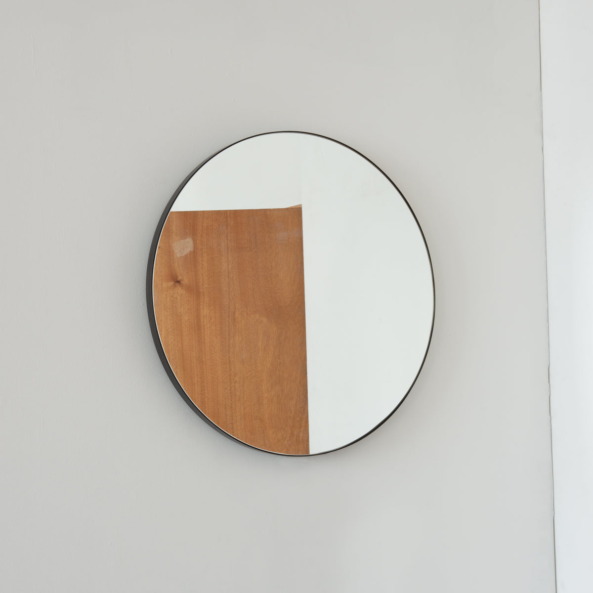 Orbis™ Illuminated Contemporary Round Mirror with a Bronze Patina Brass Frame