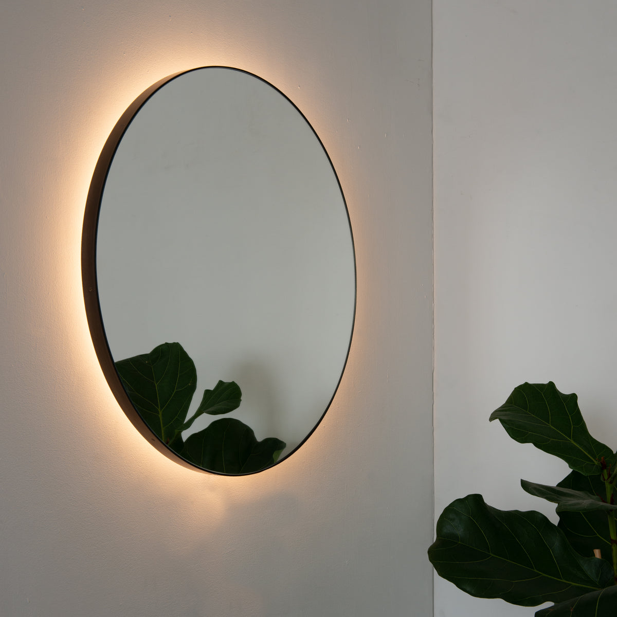 Orbis™ Illuminated Contemporary Round Mirror with a Bronze Patina Brass Frame