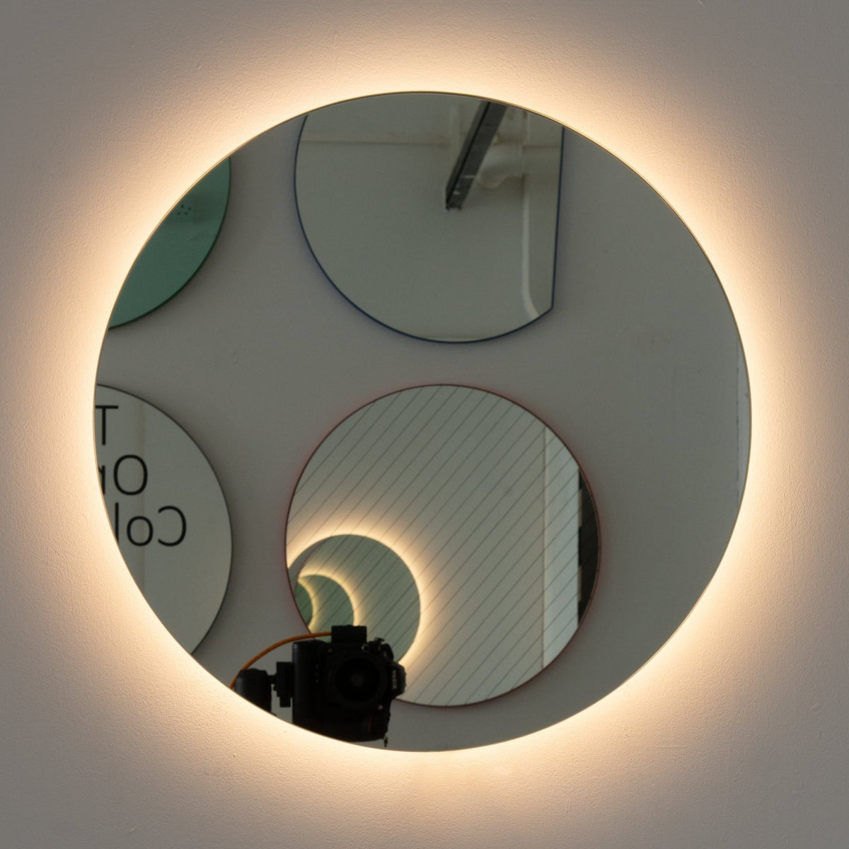 Contemporary back illuminated Orbis™ round frameless mirror