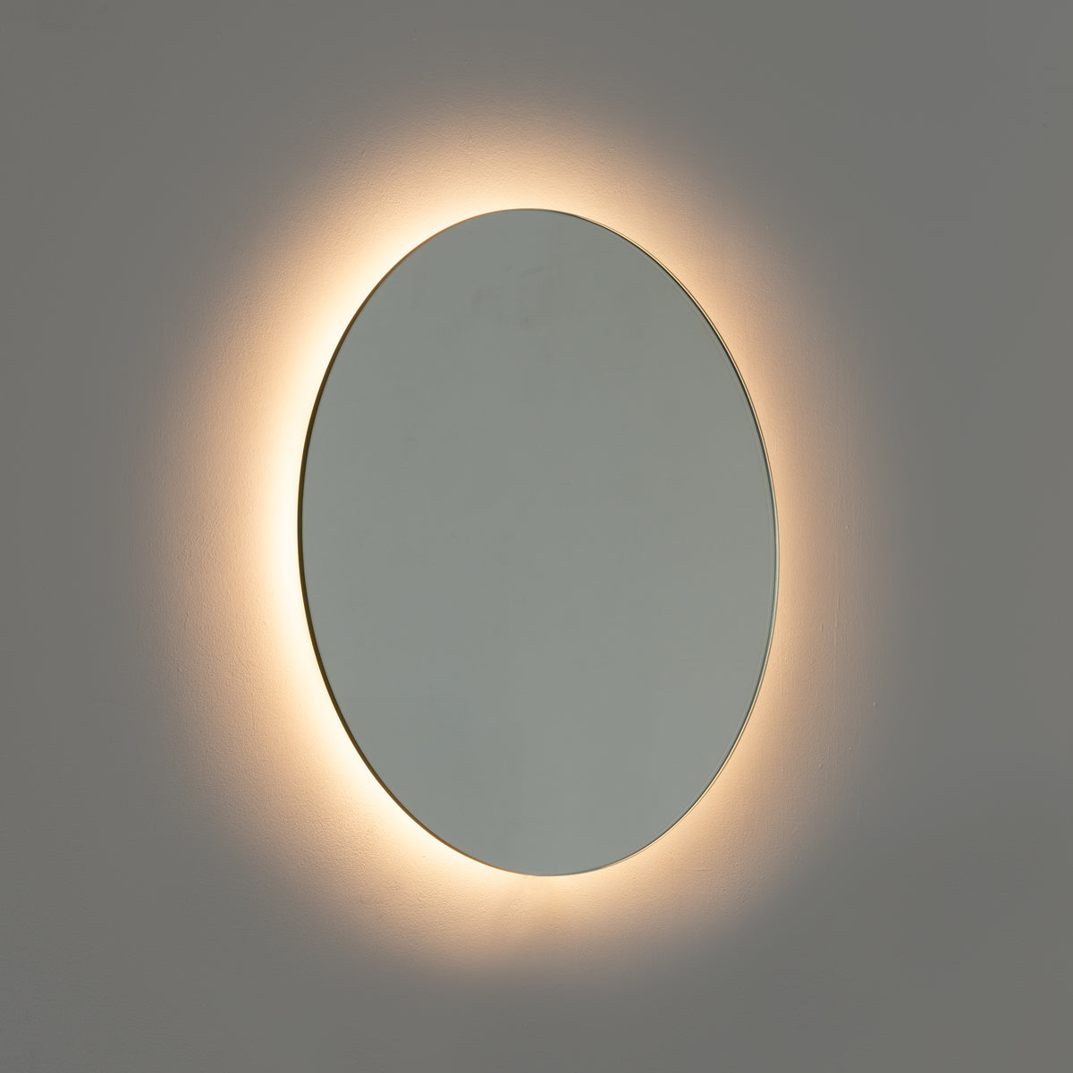 Contemporary back illuminated Orbis™ round frameless mirror