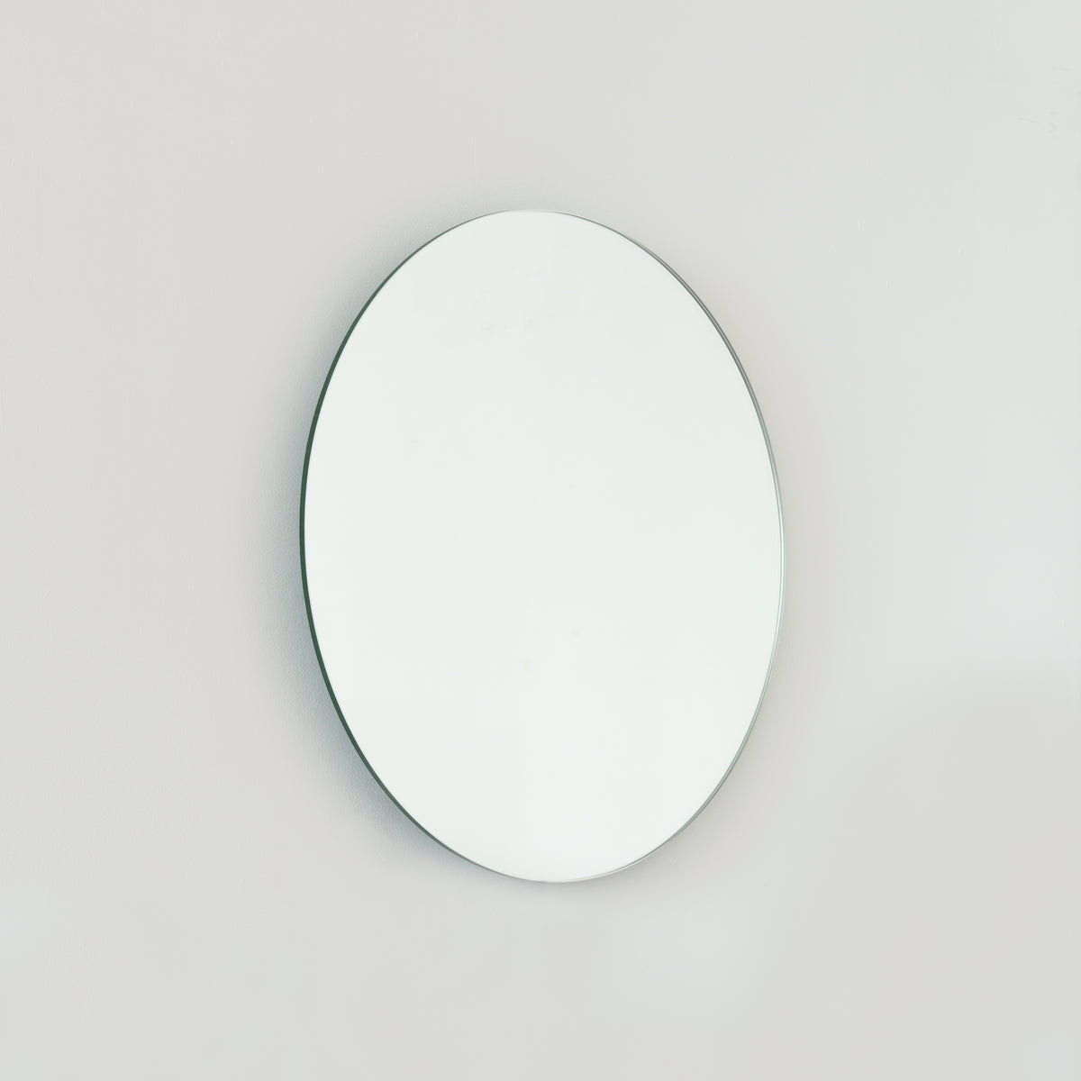 Orbis™ Back Illuminated Round Minimalist Frameless Mirror