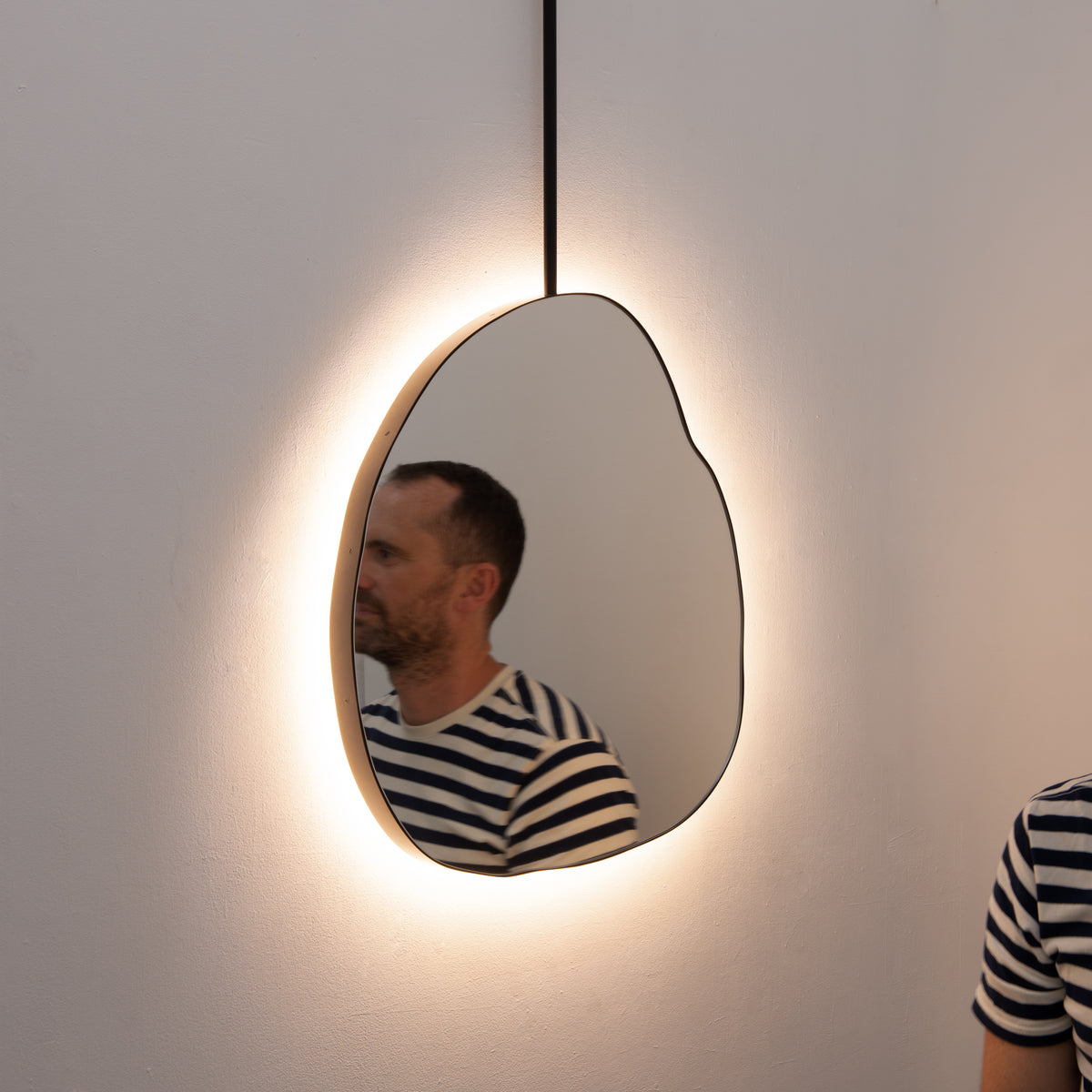 Back Illuminated Ergon™ Ceiling Suspended Freeform Mirror, Modern Black Frame