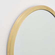 Orbis™ Round Mirror with a Handcrafted Brass Full Frame