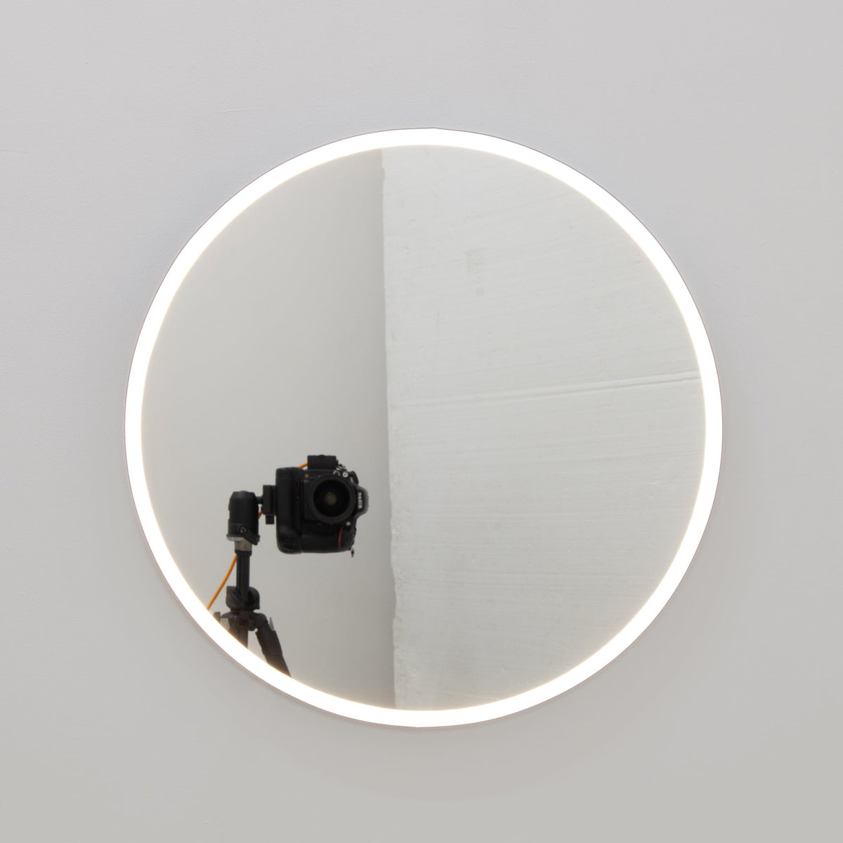 Orbis™ Front Illuminated Modern Round Mirror with a Blue Frame