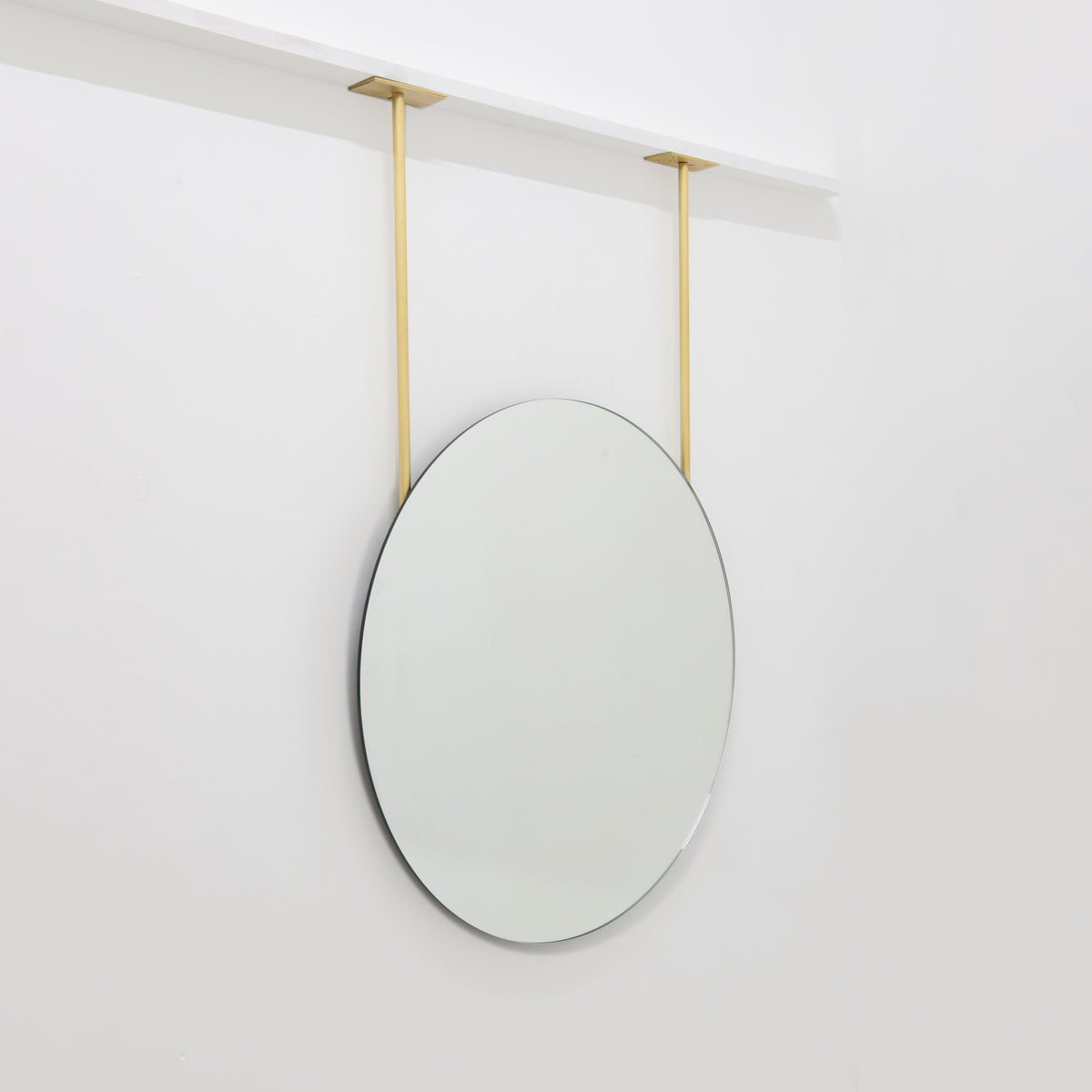 Orbis™ Frameless Ceiling Hanging Suspended Round Mirror with Two Brass Arms