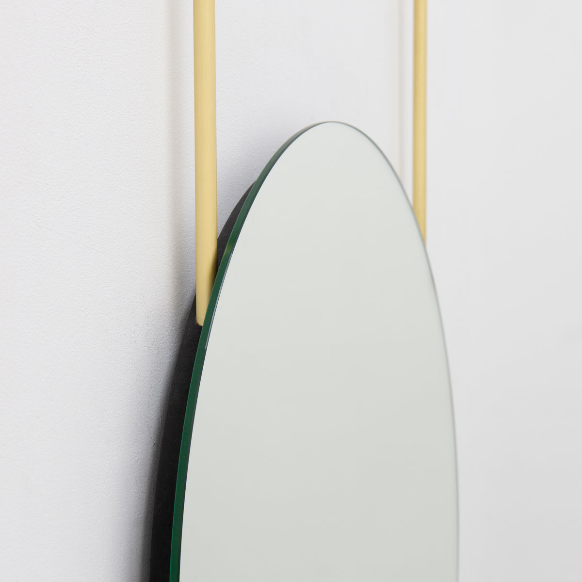 Orbis™ Frameless Ceiling Hanging Suspended Round Mirror with Two Brass Arms