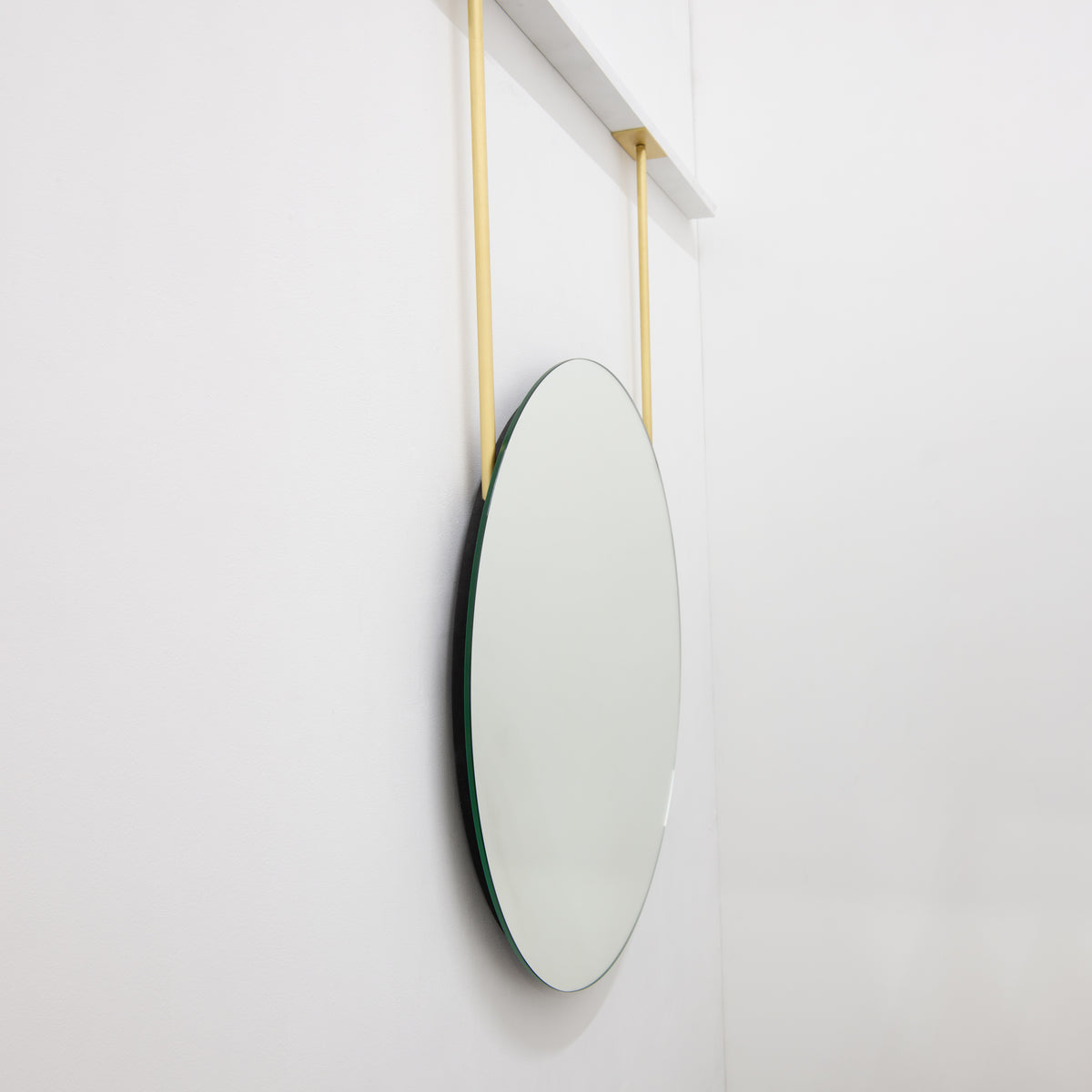 Orbis™ Frameless Ceiling Hanging Suspended Round Mirror with Two Brass Arms