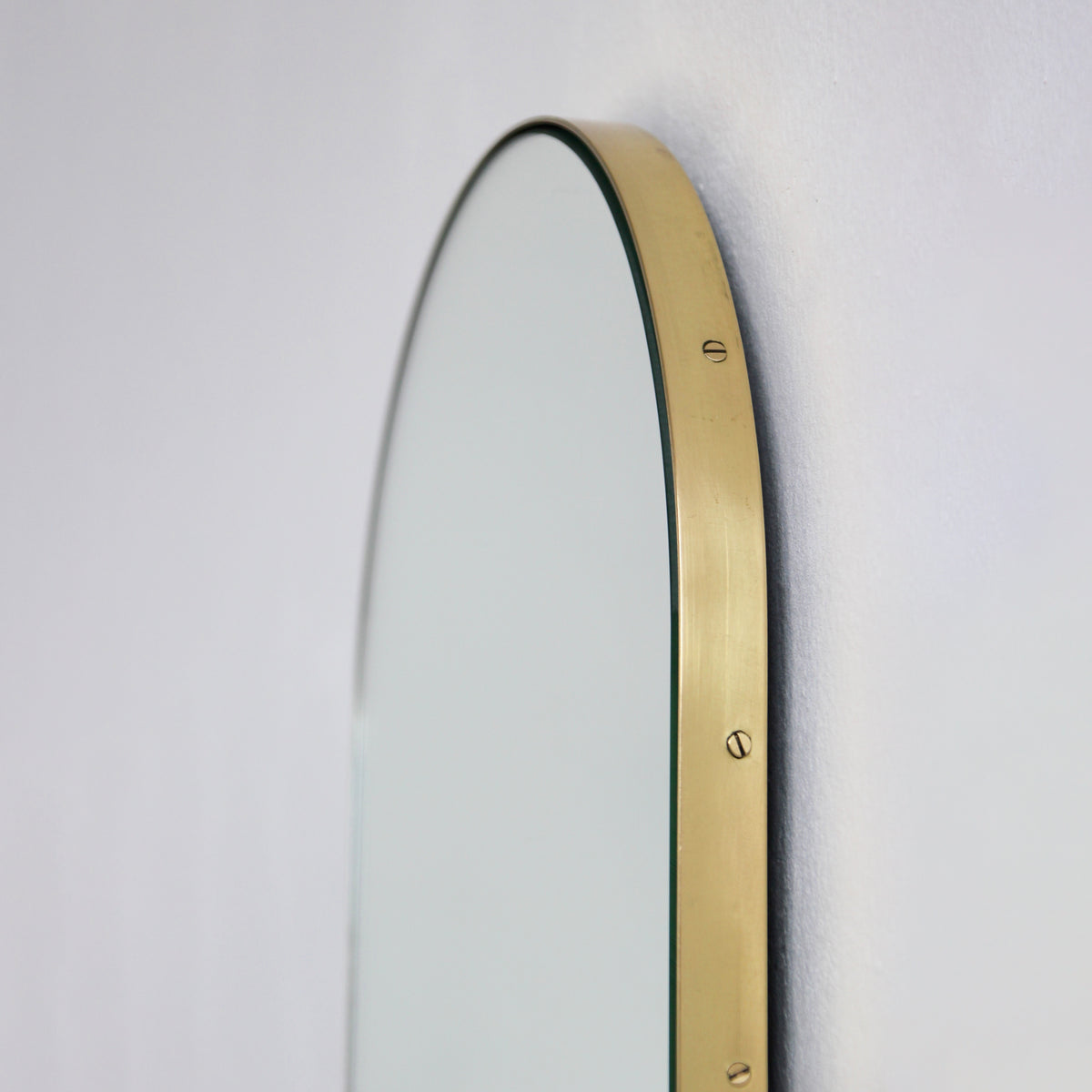 Arcus™ Arch shaped Modern Mirror with a Brass Frame