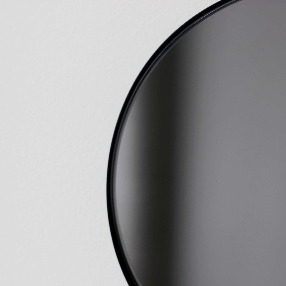 Orbis™ Round Black Tinted Contemporary Mirror with Black Frame