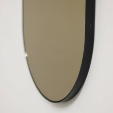 Capsula™ Capsule shaped Bronze Contemporary Mirror with a Black Frame