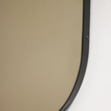 Capsula™ Capsule shaped Bronze Contemporary Mirror with a Black Frame