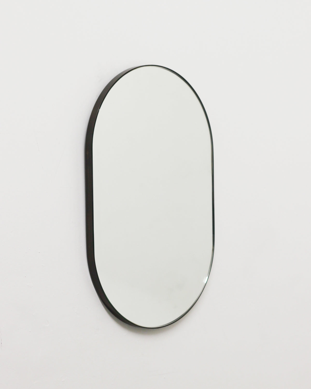 Set of 2 Bespoke Mirrors - Capsula brass frame with bronze patina finish and Quadris with bespoke RAL coloured frame