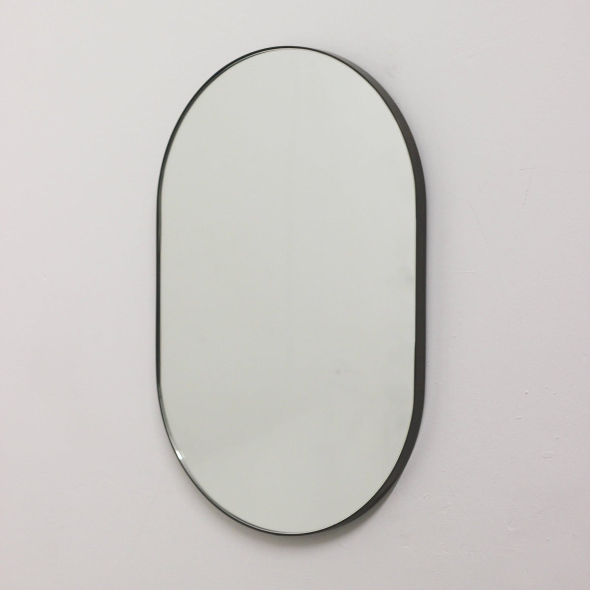Capsula™ Capsule Shaped Bespoke Mirror with Patina Frame