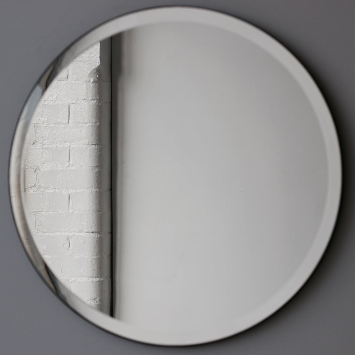 Elegant Orbis™ Round Bevelled Frameless Mirror with Velvet Backing