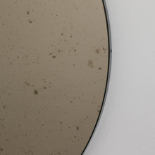 Orbis™ Antiqued Bronze Tinted Round Elegant Mirror with a Black Frame