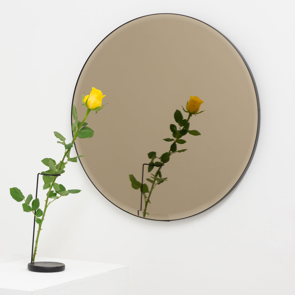 Orbis™ Bevelled Bronze Tinted Decorative Round Mirror with a Black Metal Frame