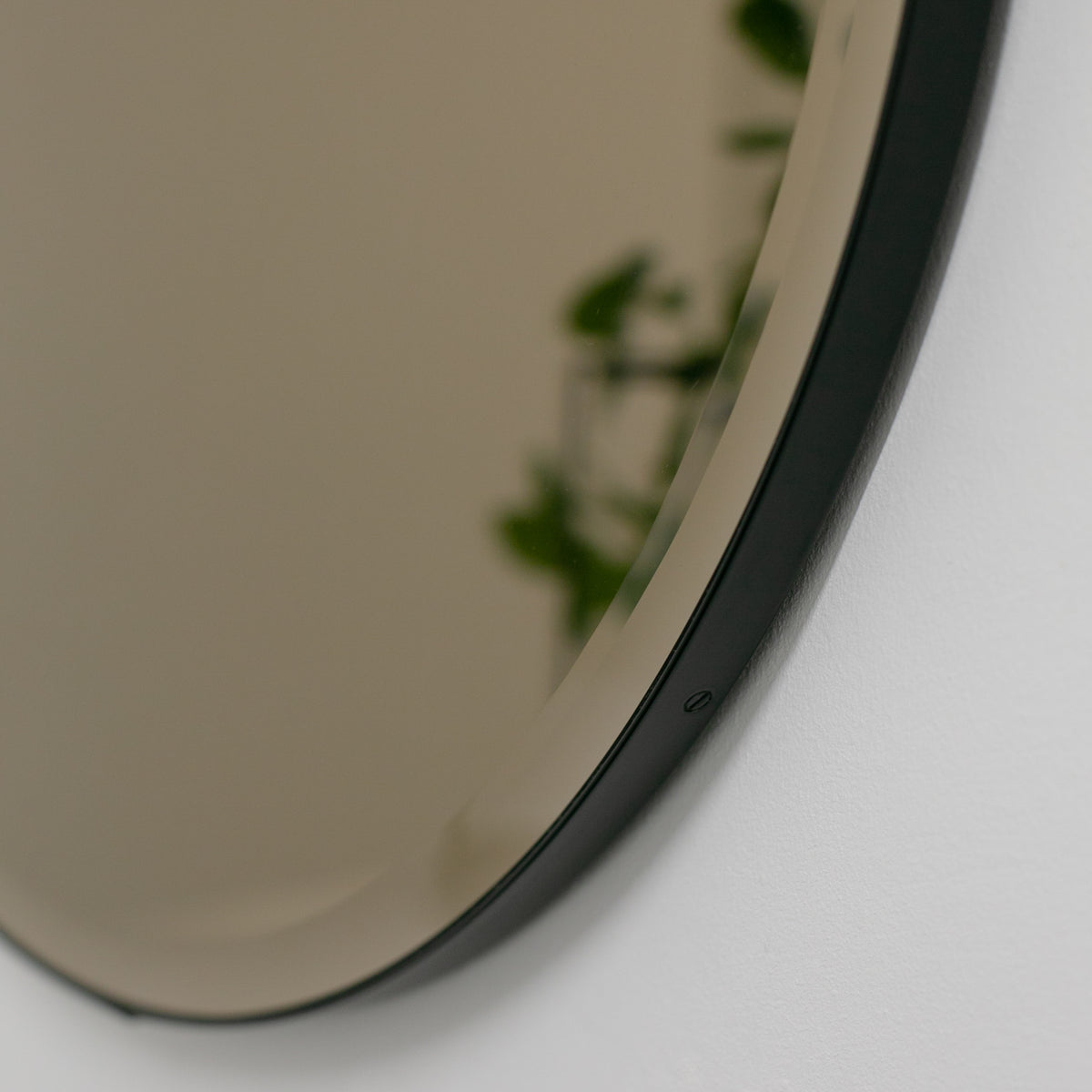 Orbis™ Bevelled Bronze Tinted Decorative Round Mirror with a Black Metal Frame