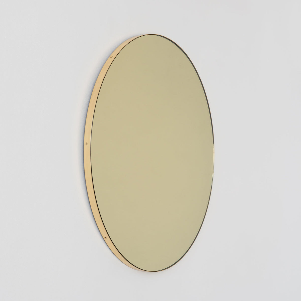 In Stock Orbis Round Gold Tinted Contemporary Mirror with a Brass Frame
