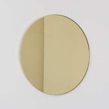 In Stock Orbis Round Gold Tinted Contemporary Mirror with a Brass Frame