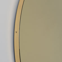 In Stock Orbis Round Gold Tinted Contemporary Mirror with a Brass Frame