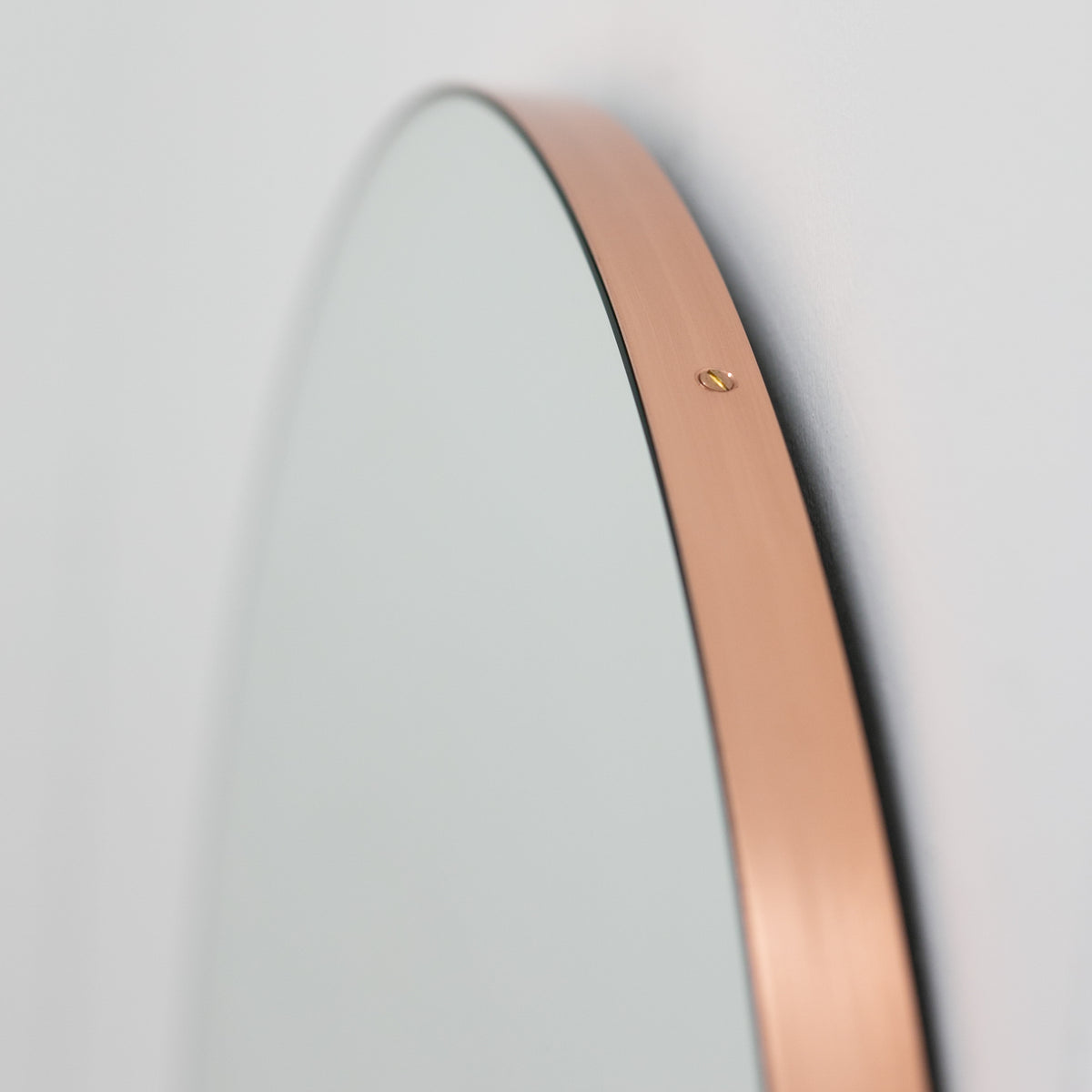 Orbis™ Round Mirror with Minimalist Copper Frame