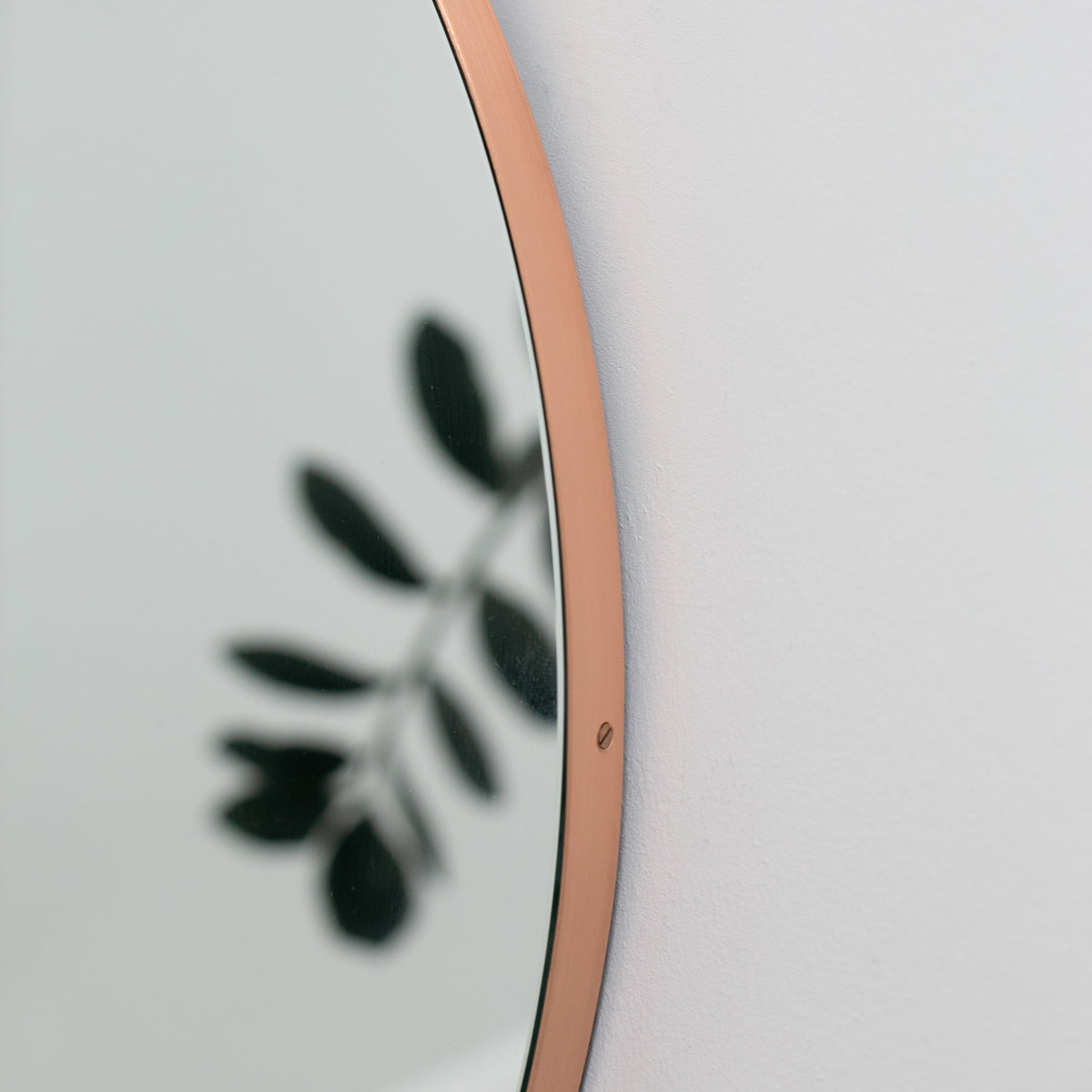 Orbis™ Round Mirror with Minimalist Copper Frame
