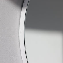 Orbis™ Round Minimalist Mirror with a Modern White Frame