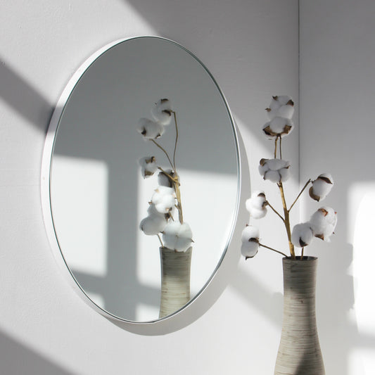 Orbis™ Round Minimalist Mirror with a Modern White Frame