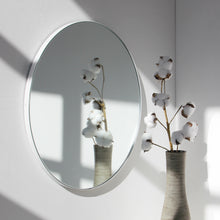 Orbis™ Round Minimalist Mirror with a Modern White Frame