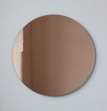 Orbis™ Back Illuminated Round Minimalist Frameless Mirror