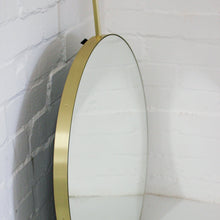 Orbis™ Ceiling Suspended Modern Round Mirror with a Brushed Brass Frame
