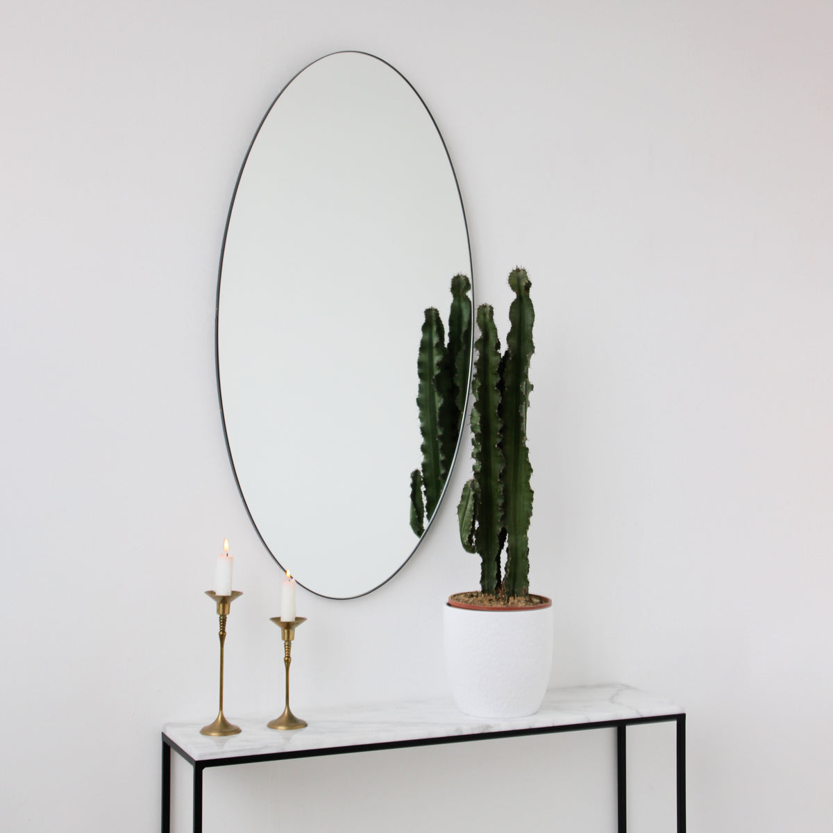 Ovalis™ Oval shaped Contemporary Mirror with a Black Frame, Customisable