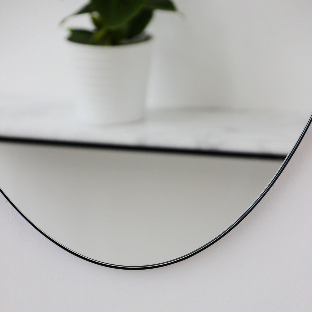 Ovalis™ Oval shaped Contemporary Mirror with a Black Frame, Customisable