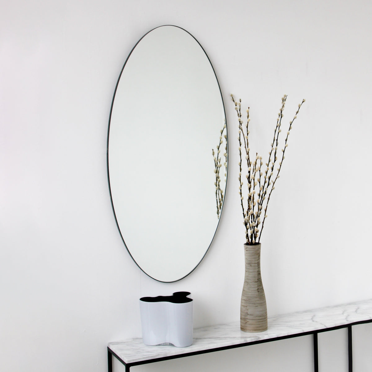 Ovalis™ Oval shaped Contemporary Mirror with a Black Frame, Customisable