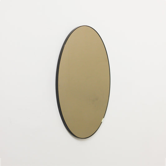 Ovalis™ Oval shaped Bronze Contemporary Mirror with Brass Patina Frame