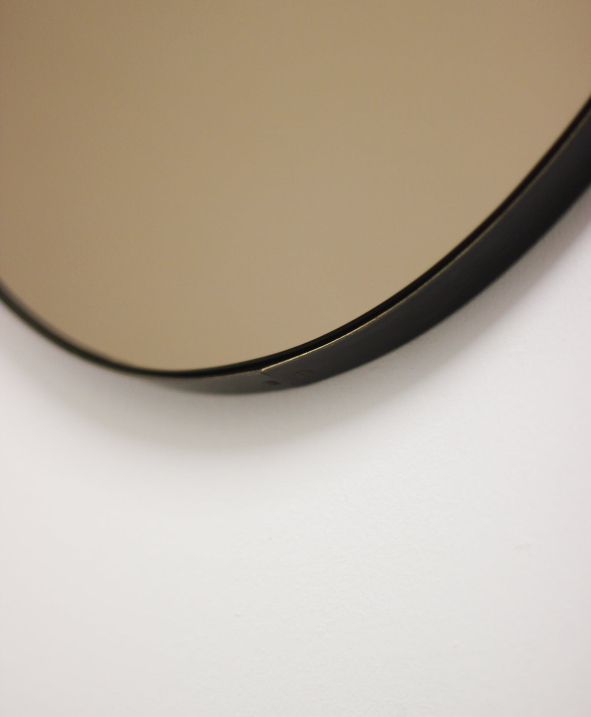 Ovalis™ Oval shaped Bronze Contemporary Mirror with Brass Patina Frame
