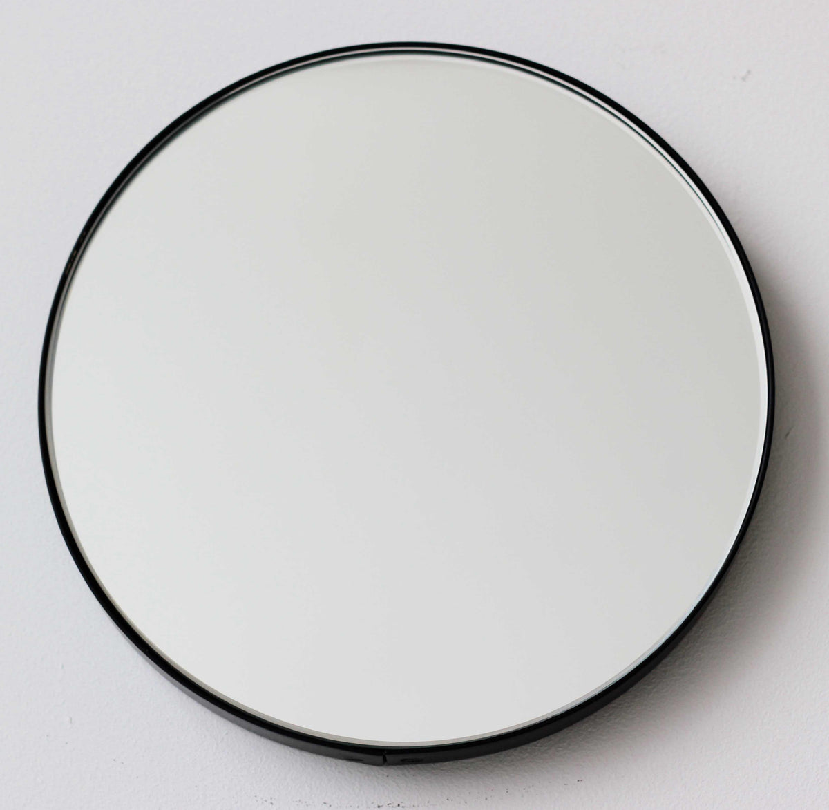 Orbis™ Round Mirror with Minimalist Black Frame