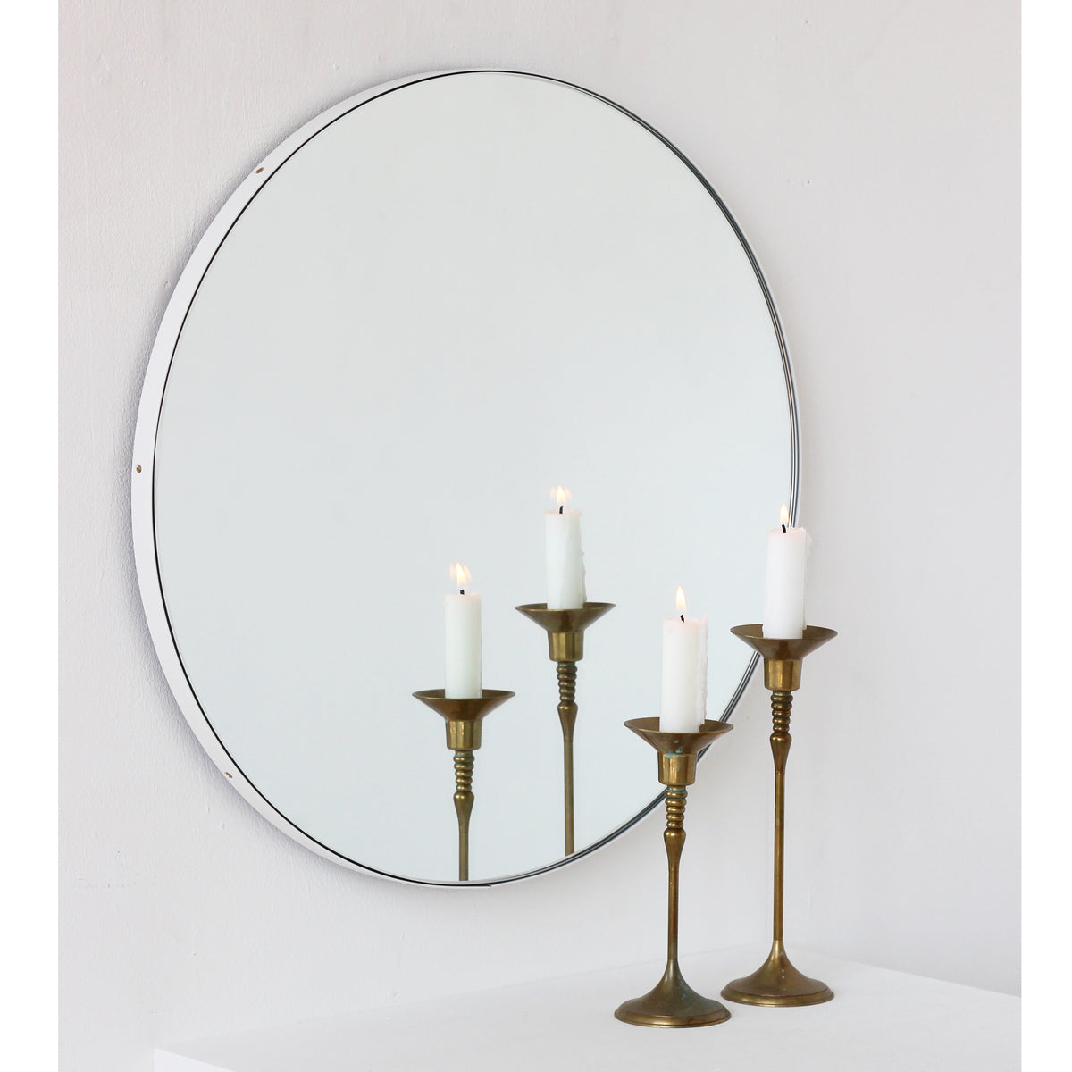 Orbis™ Round Minimalist Mirror with a Modern White Frame